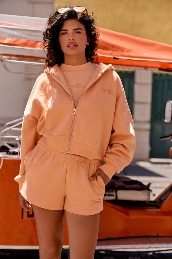 Kaiia Embossed Logo Oversized Zip Through Hoodie Peach