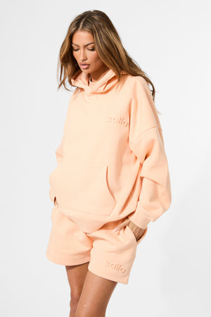 Kaiia Embossed Logo Oversized Hoodie Orange Sherbet