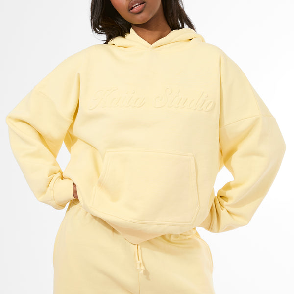 Kaiia Studio Embossed Script Logo Oversized Hoodie Banana