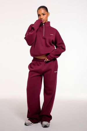 Kaiia Chrome Logo Mid Rise Wide Leg Joggers Burgundy