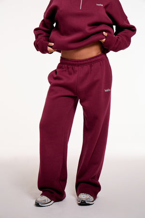 Kaiia Chrome Logo Mid Rise Wide Leg Joggers Burgundy