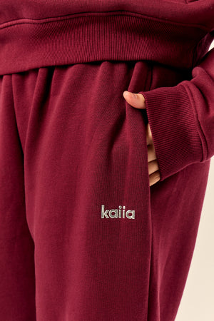 Kaiia Chrome Logo Mid Rise Wide Leg Joggers Burgundy