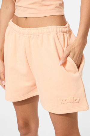 Kaiia Embossed Logo Sweat Shorts Orange Sherbet