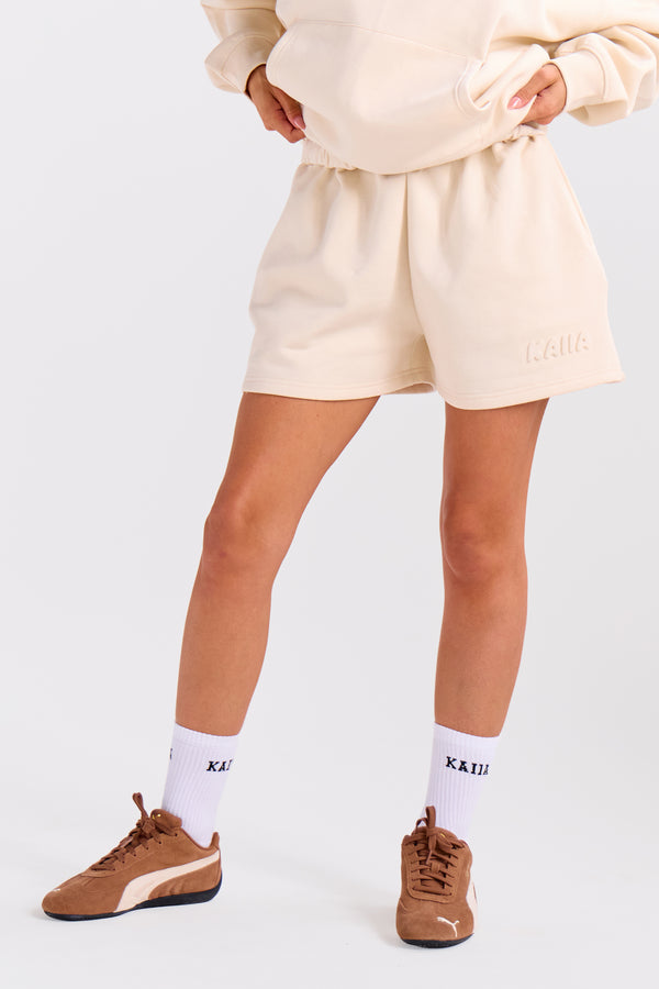 Kaiia Embossed Bubble Logo Mini Sweat Shorts Oatmilk