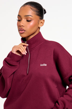 Kaiia Chrome Logo Oversized Quarter Zip Sweatshirt Burgundy