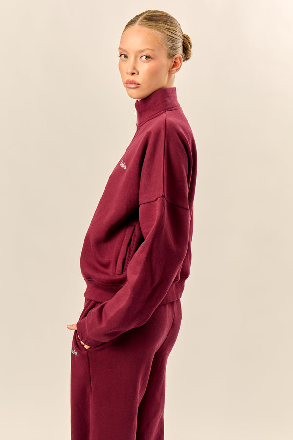 Kaiia Chrome Logo Oversized Quarter Zip Sweatshirt Burgundy