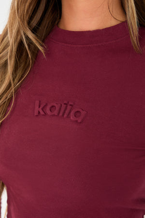 Kaiia Embossed Logo Long Sleeve Baby Tee Dark Cherry