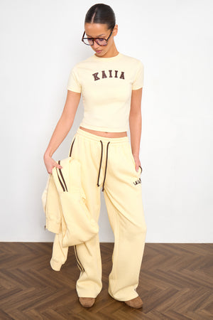 Kaiia Slogan Baby Tee Butter Yellow & Brown