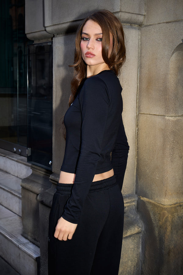 Kaiia Chrome Logo Fitted Long Sleeve Top Black