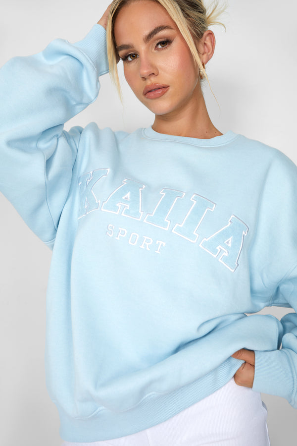 KAIIA SLOGAN OVERSIZED SWEATSHIRT LIGHT BLUE