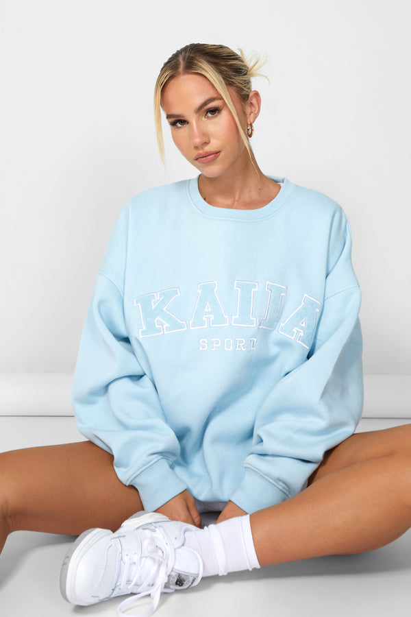 KAIIA SLOGAN OVERSIZED SWEATSHIRT LIGHT BLUE
