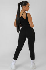 ASYMMETRIC STRAPPY KAIIA SPORT CROP TOP BLACK