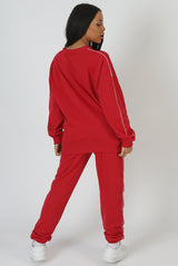 OVERSIZED VARSITY PIPING DETAIL SWEATSHIRT RED