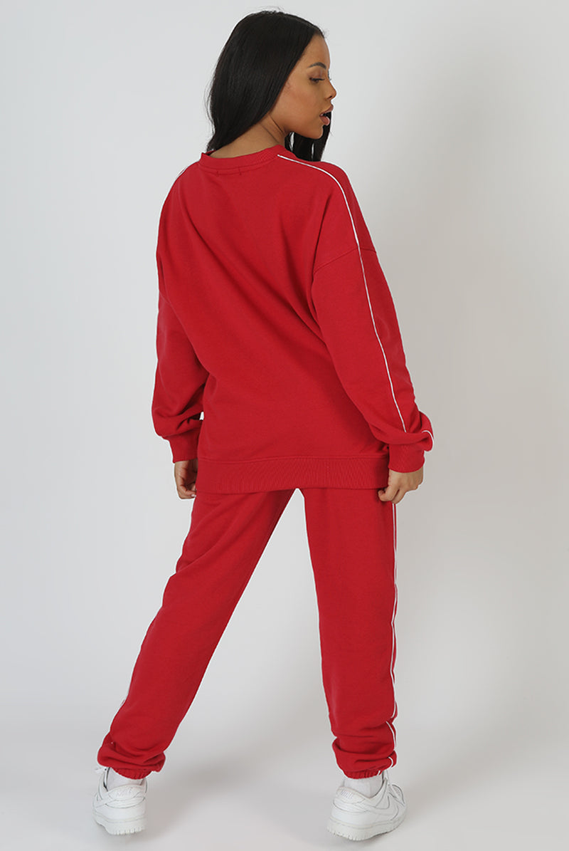 OVERSIZED VARSITY PIPING DETAIL SWEATSHIRT RED