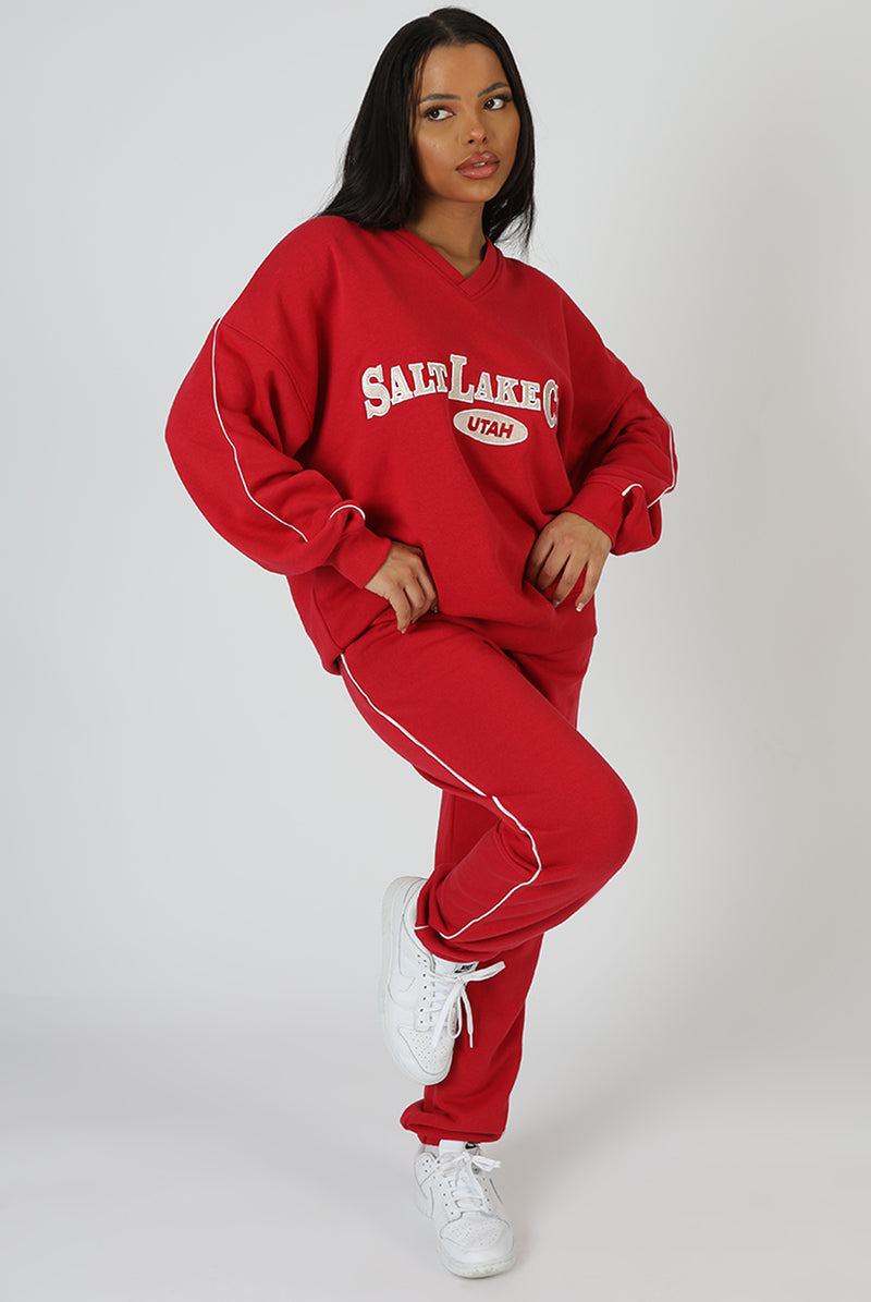 OVERSIZED VARSITY PIPING DETAIL SWEATSHIRT RED