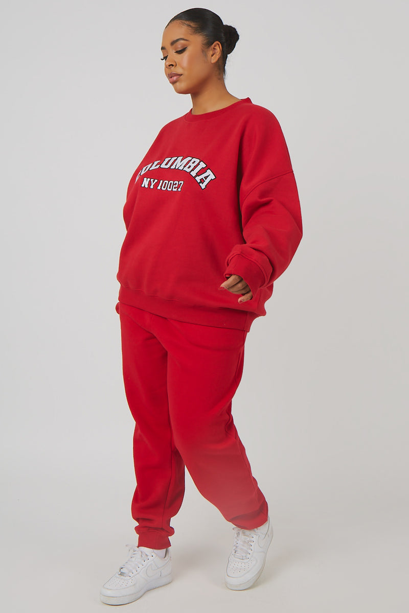 CURVE OVERSIZED EMBROIDERED SLOGAN 90S JOGGERS RED
