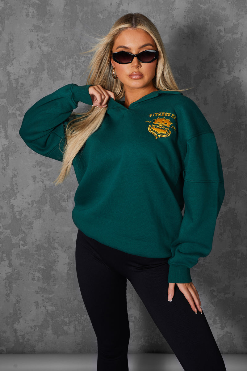 SPORTS CLUB EMBROIDERED BADGE OVERSIZED RUGBY SWEATSHIRT FOREST GREEN