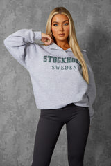 OVERSIZED STOCKHOLM SLOGAN RUGBY SWEATSHIRT GREY MARL